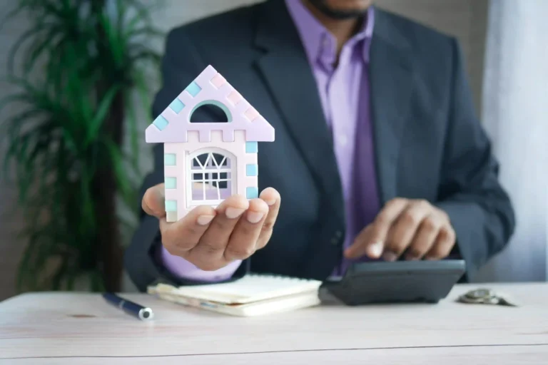 capital gains tax Colombia 2026 — foreigner reviewing tax documents before selling property