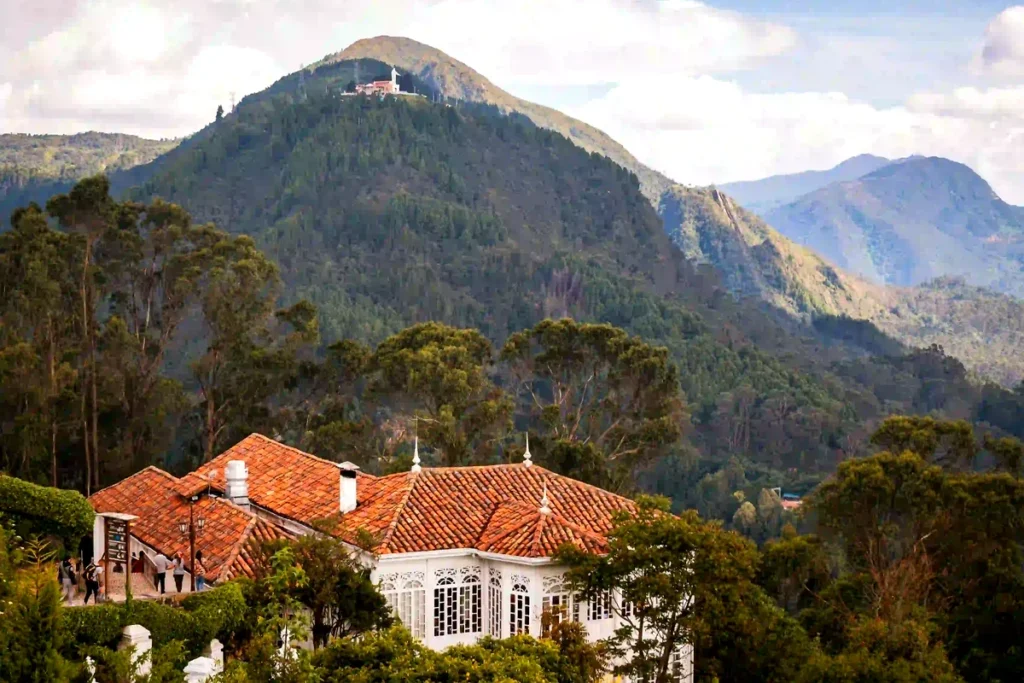 buying property in Colombia 2026 — foreigner reviewing property documents with Colombian notary