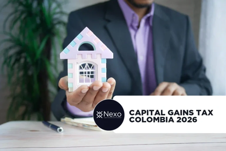 capital gains tax Colombia 2026 — foreigner reviewing tax documents before selling property
