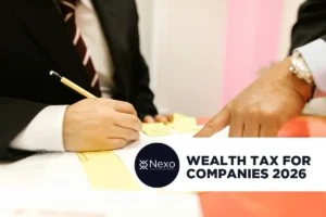 impuesto al patrimonio 2026 Colombia - balance financiero de empresa sobre escritorio