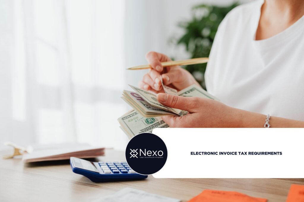 colombia electronic invoice tax deduction requirements - accountant reviewing electronic invoices in office