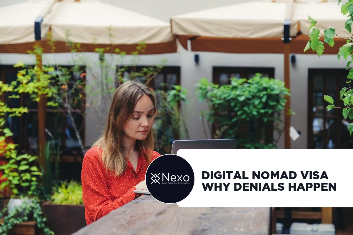 digital nomad visa colombia rejection 2026 - laptop and passport on a desk in Medellín