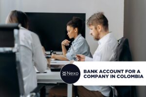Bank Account for a Company in Colombia: What Foreign Founders Need to Know in 2026 bank account for a company in Colombia 2026 - foreign founder reviewing corporate documents with a Colombian bank advisor