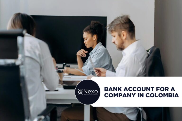 bank account for a company in Colombia 2026 - foreign founder reviewing corporate documents with a Colombian bank advisor