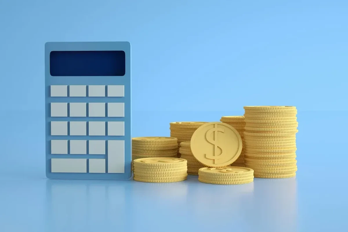Wealth Tax in Colombia 2026: Who Has to Pay It (And Why the Number You've Seen Might Be Wrong) Calculator and stacked coins used to estimate Colombia wealth tax liability for 2026
