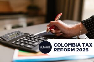 Colombia Tax Reform 2026: What We Know So Far reforma tributaria 2026 Colombia - empresario extranjero revisando cambios tributarios con asesor