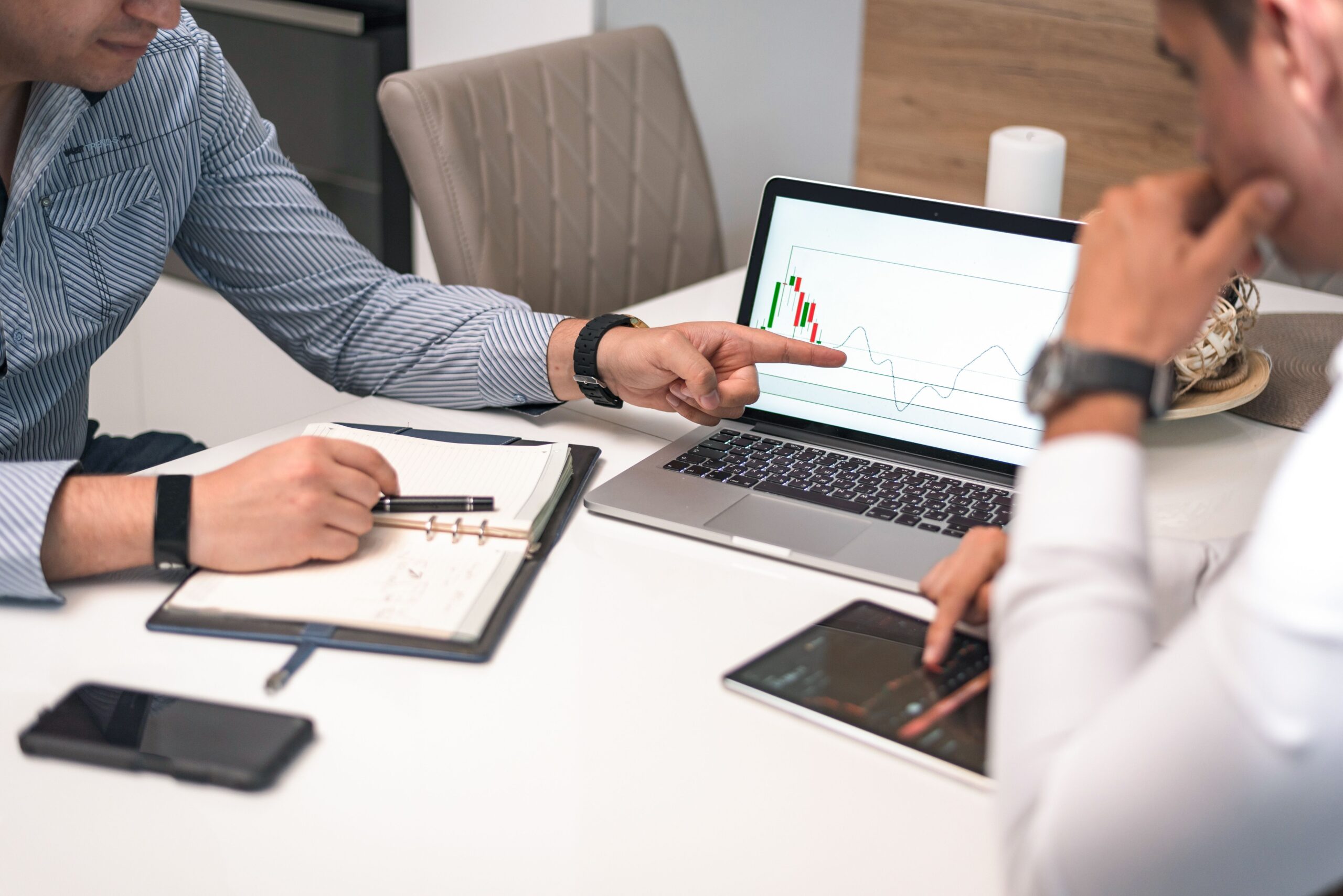Advisors reviewing how the announced reform could affect a foreign-owned company Colombia tax reform 2026 - advisors reviewing the financial impact for a company