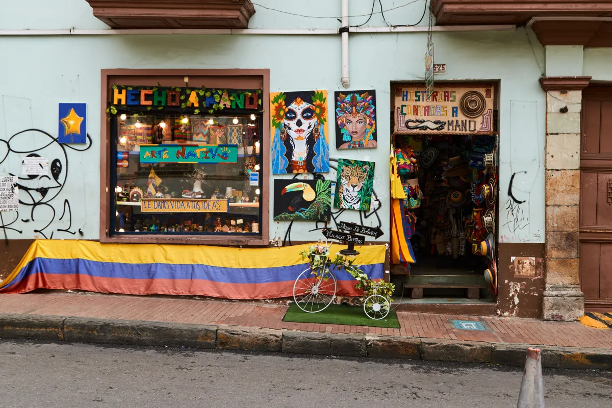 shop with a Colombian flag in a town popular with digital nomads
