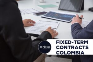 Fixed-Term Contract in Colombia: The 4-Year Limit That Changes Everything (Law 2466 of 2025) contrato a término fijo Colombia 2026 - employer reviewing employment contracts and renewal dates